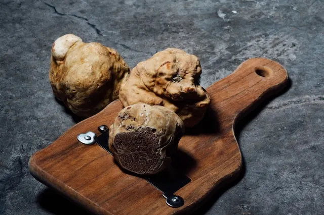 Brown cookies on brown wooden chopping board